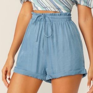 Drawstring waisted high shorts.